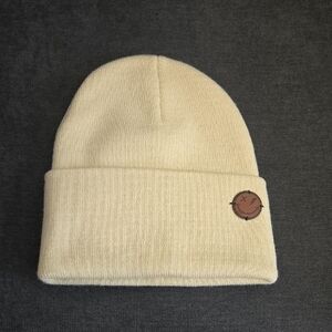 Beige Knit Beanie with Smiley Patch. Never Worn.